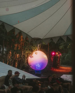 People are chilling at the Whole festival Berlin