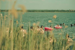 People swimming at the MELT festival in Berlin 
