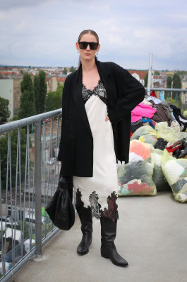 Woman posing in lace dress