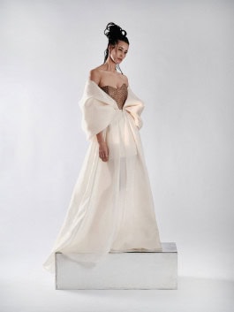 Model posing in dress by Felder Felder 