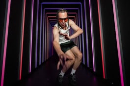 Man is posing in the Upside Down Berlin