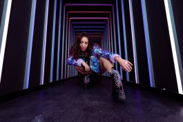 Women is posing in the Upside Down Berlin