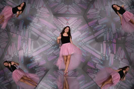 Women is posing in the Upside Down Berlin