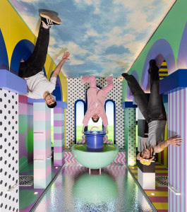 People are posing in the Upside Down Berlin