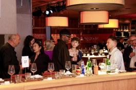 People chatting at Berlin Fashion Week Opening & Firesdinner