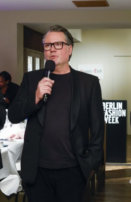 Scott Lipinski speaks from the podium at the Berlin Fashion Week Opening Dinner