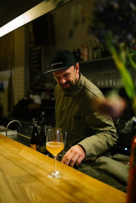 Bartender behind the bar at The Rad bar in Berlin
