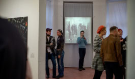 visitors among exhibits in one of the artist residencies in Berlin - SomoS