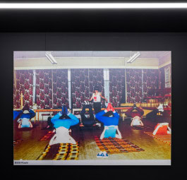 exhibition view Hamburger Bahnhof photo people doing yoga with instructor