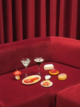 Photos of candles in the shape of different foods