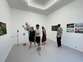 visitors among exhibits in one of the artist residencies in Berlin - Scope BLN