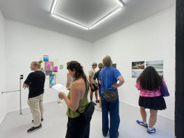 visitors among exhibits in one of the artist residencies in Berlin - Scope BLN