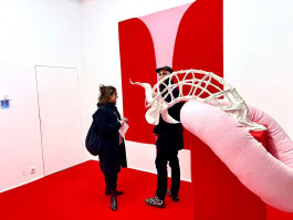 man and woman among exhibits in one of the artist residencies in Berlin - Scope BLN