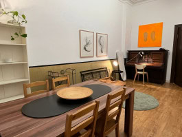 studio residence with piano and dining table in TAKT Berlin