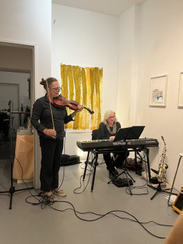 Musical performance on piano and violin at TAKT Berlin