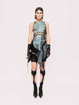 Woman in dress, tights, shoes and gloves by tHERAPY Berlin