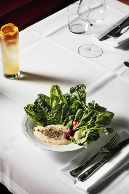 Table with Caesar Salad in Papillon