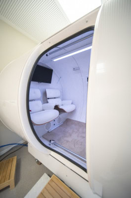 Rounded cabin with seats inside in AIVA