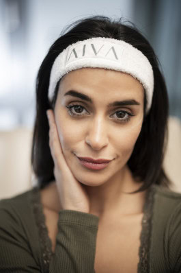 Woman after beauty treatments with AIVA hair bandage