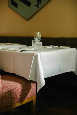 Château Royal interior, table with glasses