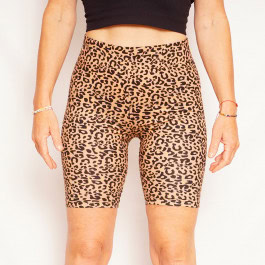 women's legs in leopard print sports shorts